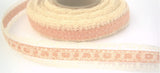 R0008 16mm Dusky Apricot Cotton Ribbon under a Cream Lace