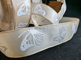 R0508 26mm Cream Taffeta-White Embossed Butterfly Ribbon by Berisfords